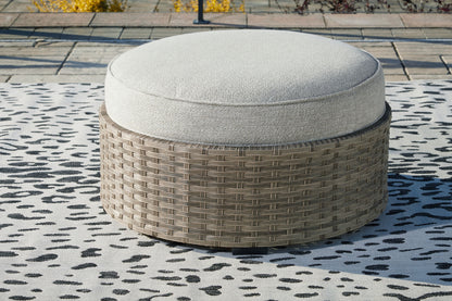 Calworth - Beige - Ottoman with Cushion