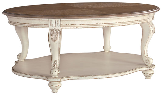 Realyn - White / Brown - Oval Cocktail Table