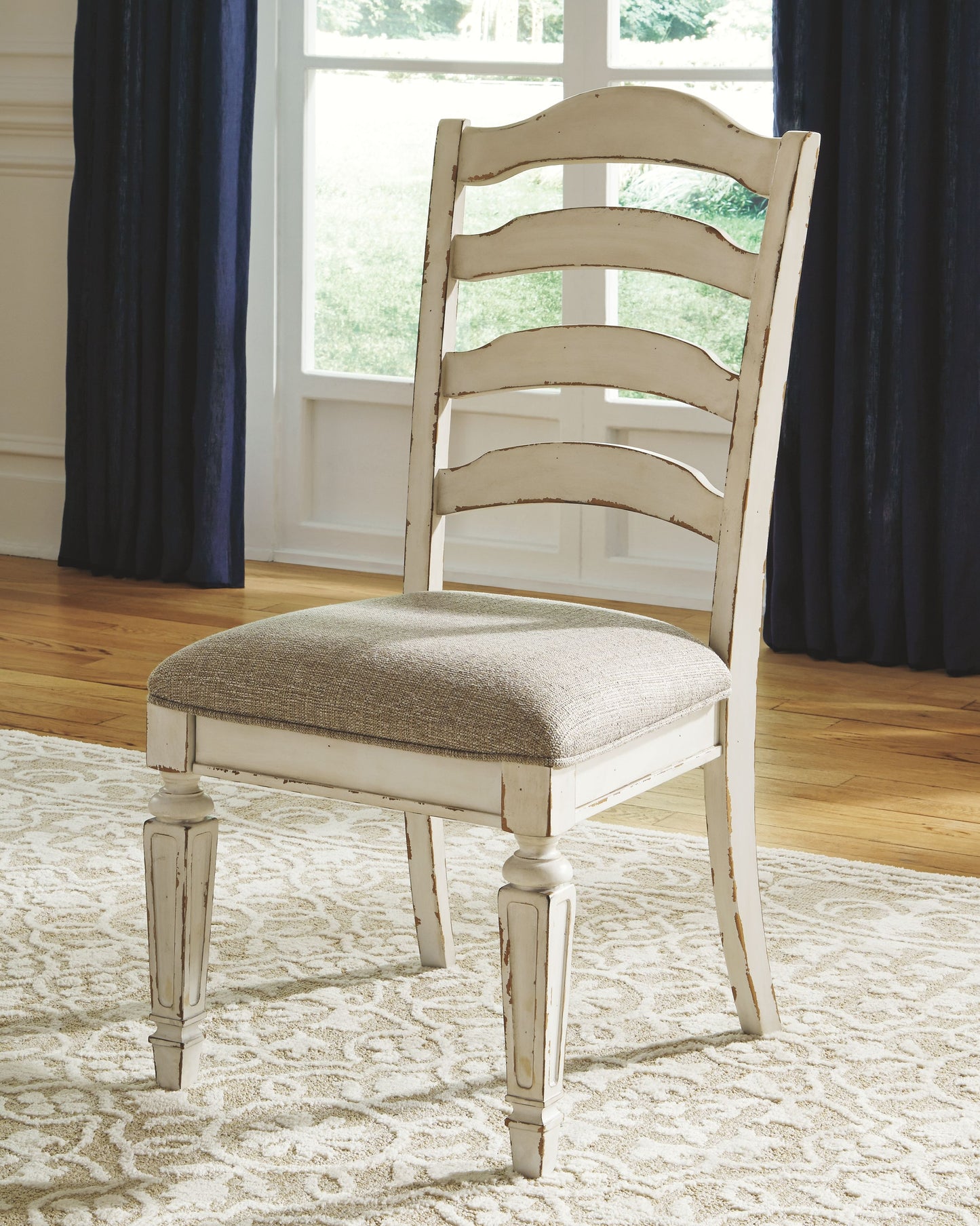 Realyn - Chipped White - Dining UPH Side Chair (Set of 2) - Ladderback